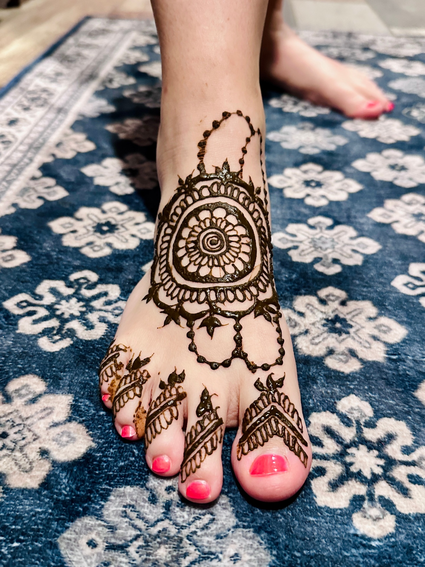 Beautiful foot henna with mandala and geometric designs